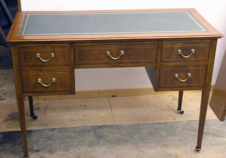 Mahogany desk after restoration and new leather