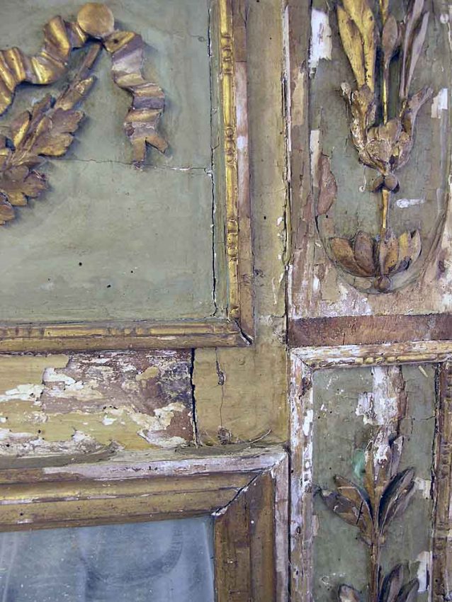 Gesso and gilding flaking off trumeau mirror