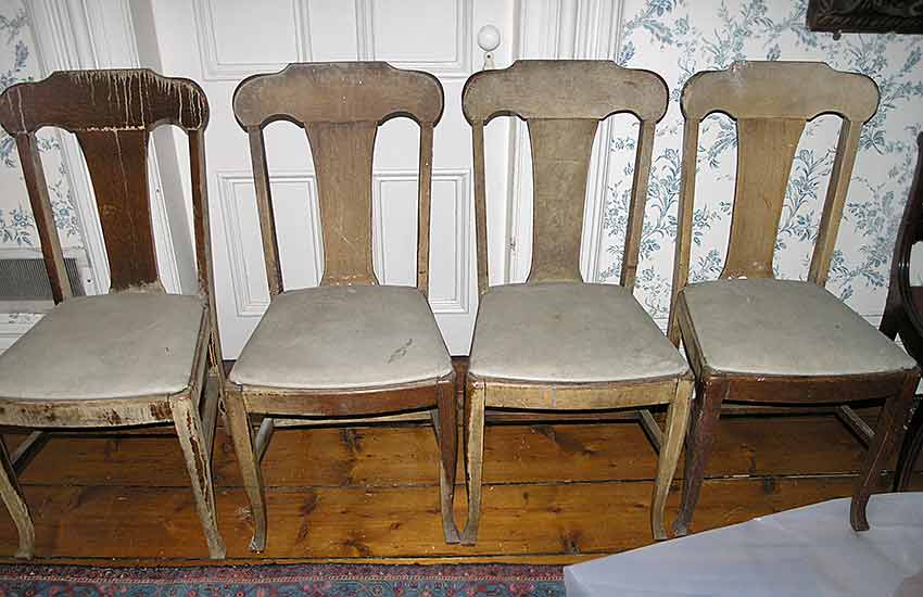 4 Oak chairs before refinishing