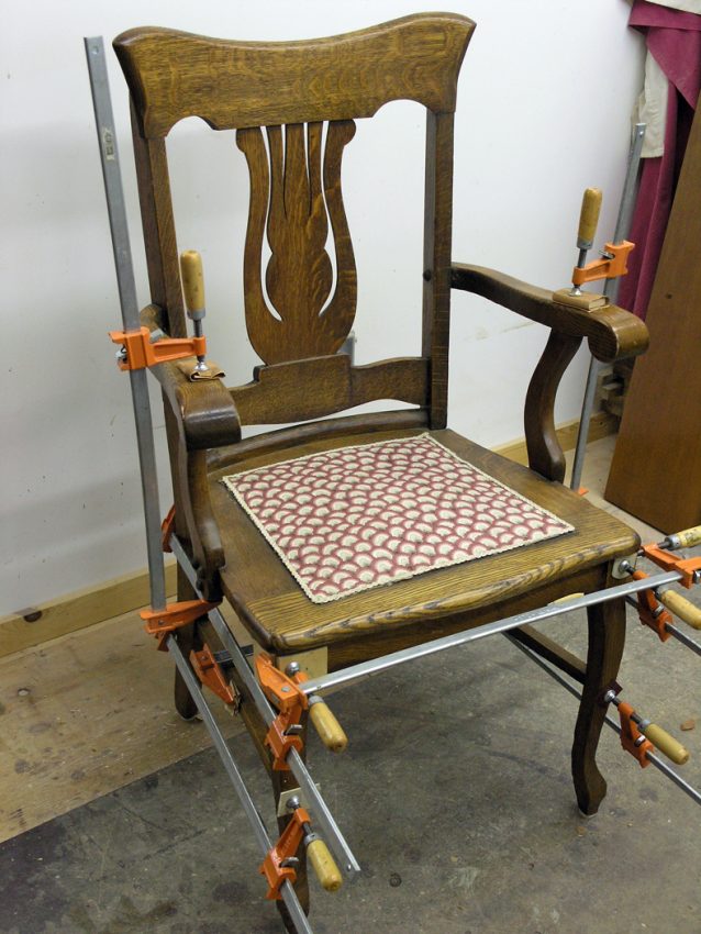 Oak chair glued and clamped